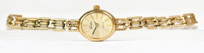 Lot 1013 - A 9ct yellow gold cocktail watch, the oval...