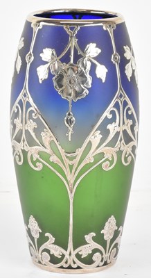 Lot 1178 - An Art Nouveau silver overlaid glass vase, the...