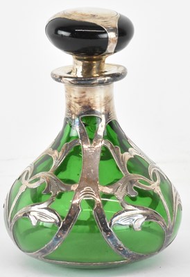 Lot 1180 - An Edwardian silver overlaid glass perfume...