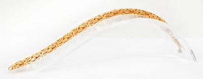 Lot 820 - A 9ct yellow gold fancy link bracelet, length...