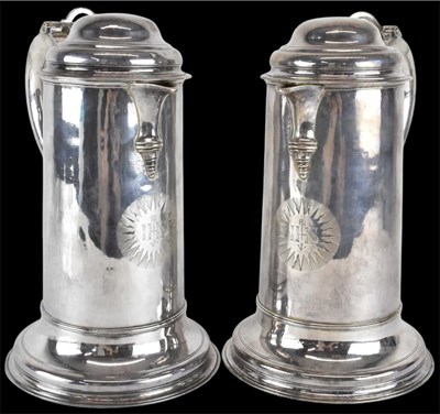 Lot 1026 - A pair of George II hallmarked silver lidded...