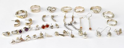 Lot 947 - A group of silver and white metal earrings,...