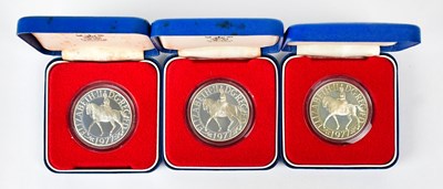 Lot 663 - Three Elizabeth II silver-proof crowns, for...