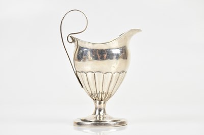 Lot 1563 - A Swedish silver cream jug, with gadrooned...