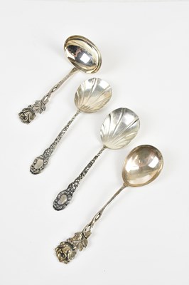 Lot 1561 - Four decorative Swedish silver spoons, three...