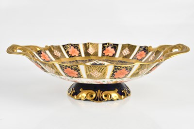 Lot 184 - ROYAL CROWN DERBY; a twin handled pedestal...