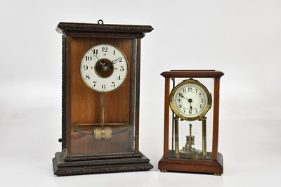 Lot 2384 - An early 20th century oak cased electric wall...