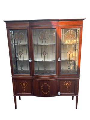 Lot 2086 - An Edwardian inlaid mahogany bowfront display...