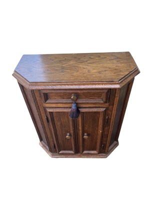 Lot 2108 - A modern oak side cupboard with single drawer...