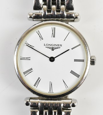 Lot 1686 - LONGINES; a lady's stainless steel wristwatch,...