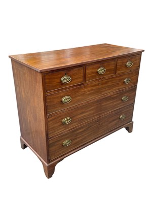 Lot 2111 - A 19th century mahogany chest, of three short...