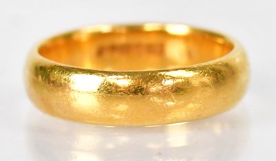 Lot 738 - A 22ct yellow gold wedding band, size Q,...