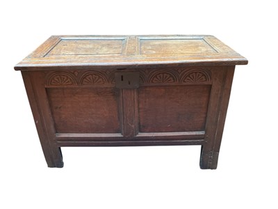 Lot 2266 - An 18th century oak coffer with carved frieze,...