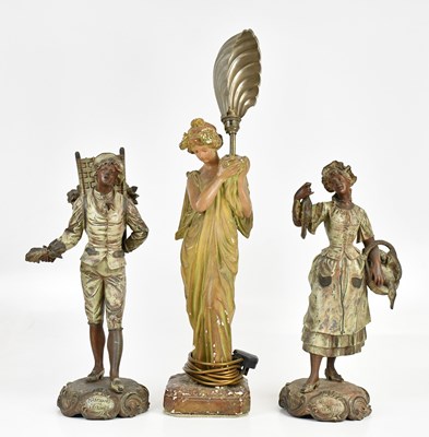 Lot 1415 - An Art Deco painted plaster figural lamp with...