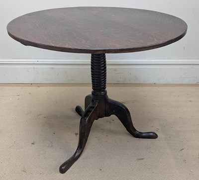 Lot 2267 - A 19th century oak tripod table, with circular...