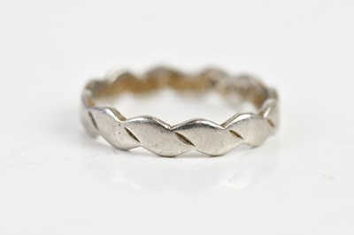 Lot 1617 - A hallmarked silver wedding band, size K,...