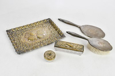 Lot 1437 - A silver plated dressing table tray, repoussé...