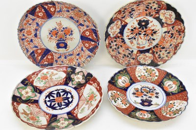 Lot 262 - Four 19th century Japanese Imari chargers, all...