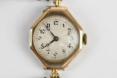 Lot 1673 - A lady's 9ct gold cased wristwatch, the dial...