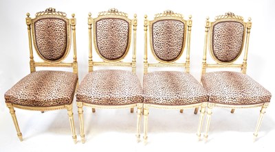 Lot 18 - A set of four French Empire style side chairs,...