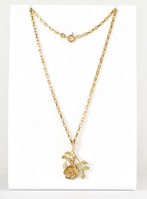 Lot 863 - A 9ct yellow gold pendant in the form of a...