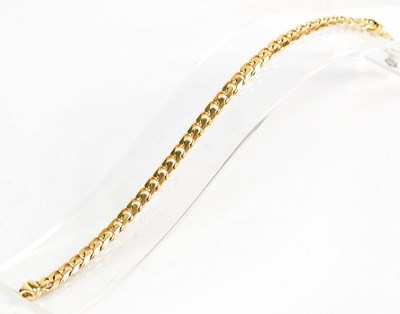 Lot 817 - A 9ct yellow gold curb link bracelet, length...