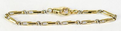 Lot 822 - A 9ct yellow and white gold fancy link...