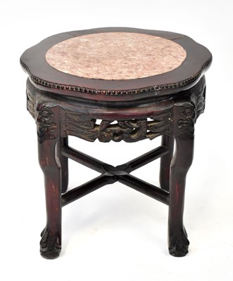Lot 54 - A Chinese hardwood jardinière stand, with...