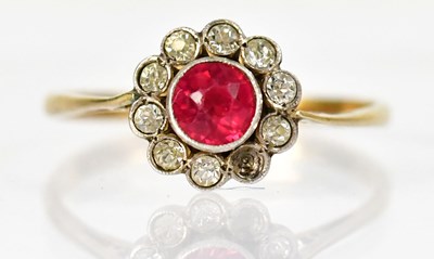 Lot 745 - An 18ct yellow gold ring set with a pink...