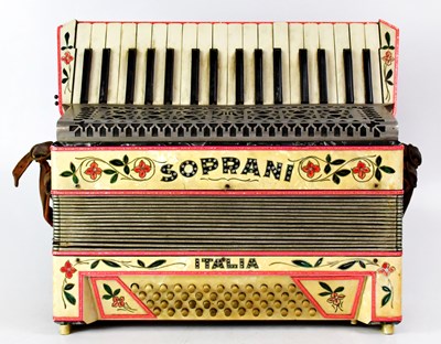 Lot 529 - A 'Soprani' accordion in associated green...