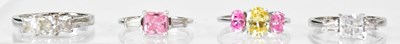 Lot 775 - Two 14ct white gold rings, one set with a...