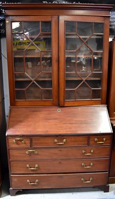 Lot 110a - An early 19th century mahogany bureau bookcase,...