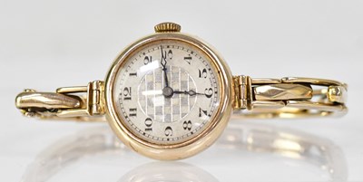 Lot 1012 - A 9ct yellow gold ladies' wristwatch, the...