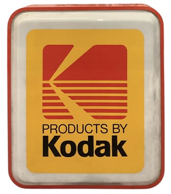 Lot 296 - KODAK; a mid century acrylic red metal framed...