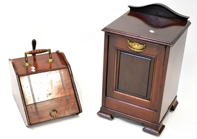 Lot 31 - An Edwardian mahogany coal scuttle with shovel,...
