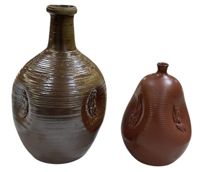 Lot 659 - A Japanese Bizen ware three dimensional doll...