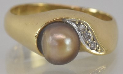 Lot 1165 - An 18ct yellow gold pearl and diamond set ring,...