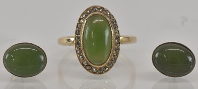 Lot 1203 - A 9ct yellow gold green stone and marcasite...