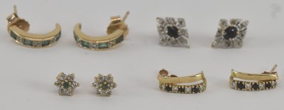 Lot 1264 - A pair of 9ct yellow gold diamond and emerald...
