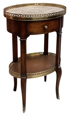 Lot 70 - A reproduction French style marble topped oval...