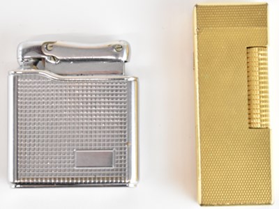 Lot 297 - DUNHILL; a gold plated Rollagas lighter with...
