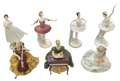 Lot 481 - COALPORT; four porcelain figures of ballerinas,...