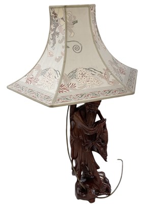 Lot 664 - An early 20th century Chinese carved root wood...