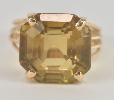 Lot 1204 - A yellow metal dress ring set with large...