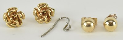 Lot 1269 - A pair of 9ct yellow gold floral ear studs and...
