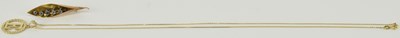 Lot 1239 - A 10ct yellow gold identity pendant on 10ct...