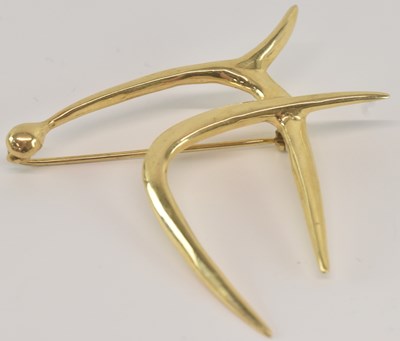 Lot 1284 - A 14ct yellow gold brooch modelled as a Hebrew...