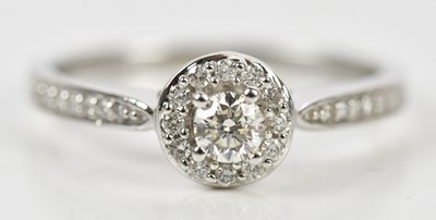 Lot 400 - A 9ct white gold diamond set dress ring, with...