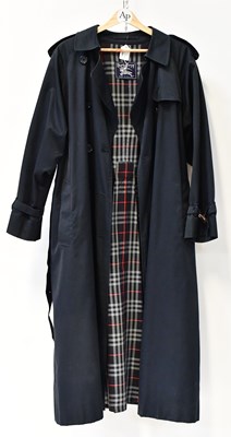Lot 401 - BURBERRYS; a ladies' navy blue overcoat.