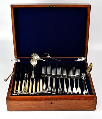 Lot 554 - A Victorian oak cased canteen containing a...